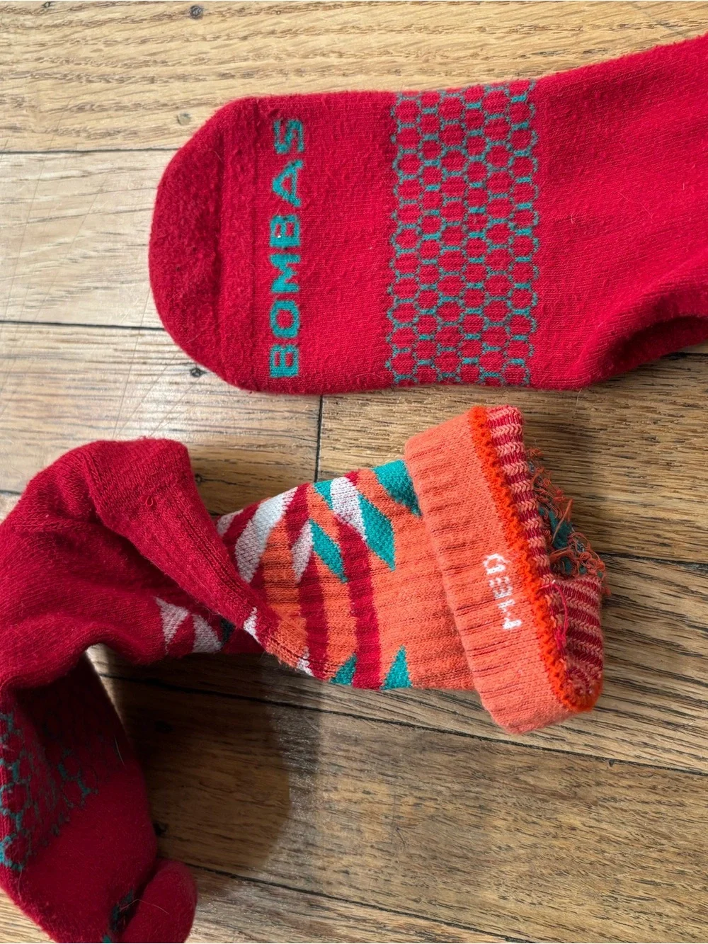 Bombas Red Athletic Crew Socks with Orange and Teal Pattern